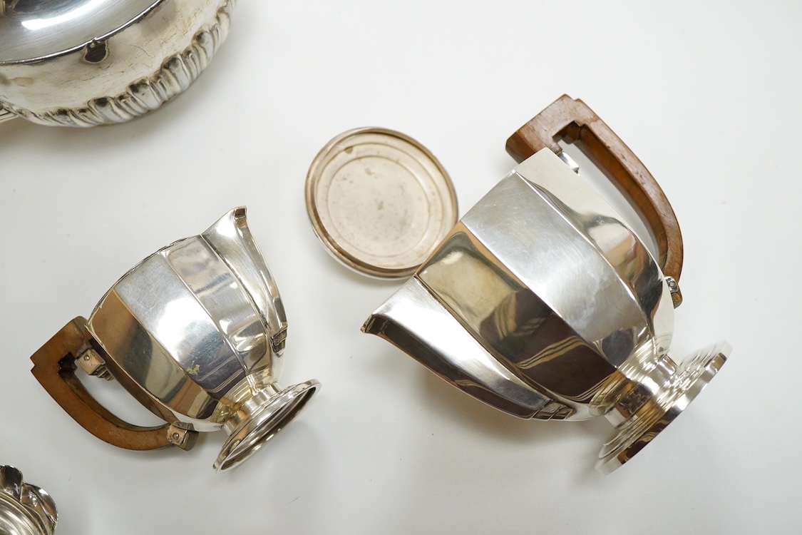 A 20th century continental 800 standard white metal hot water pot and cream jug (lacking cover and knop), gross weight 11.2oz, together with a plated teapot, sauceboat and bowl.